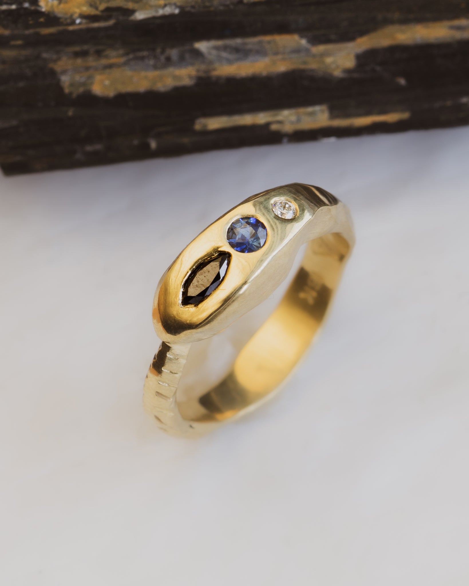Diamond and Sapphire Ouroboros Ring in 18K Gold